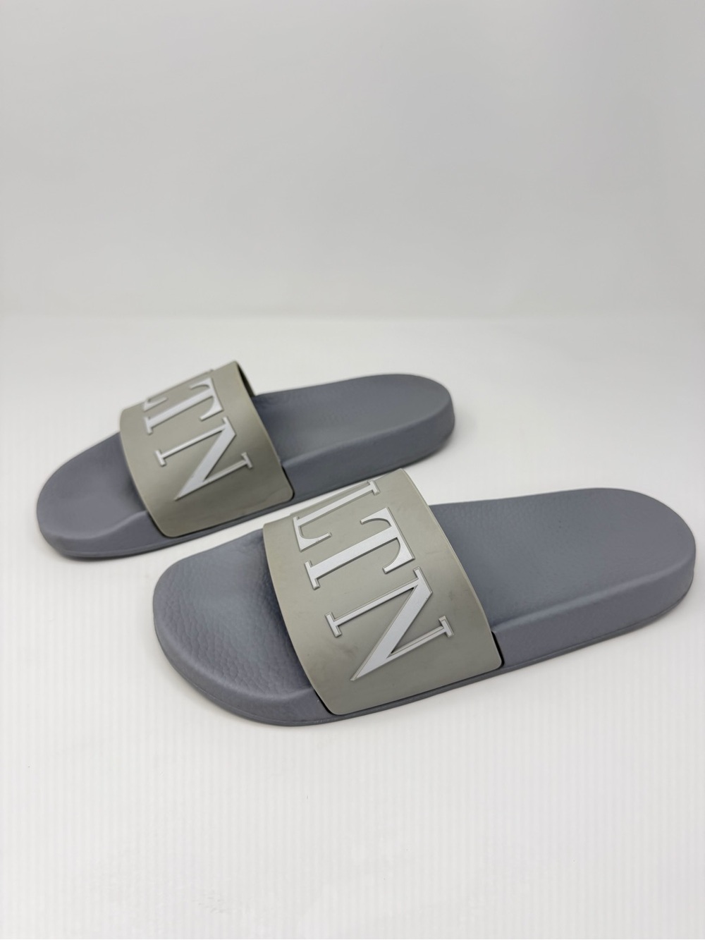 Valentino Garavani Gray Slide Sandals with Raised Logo